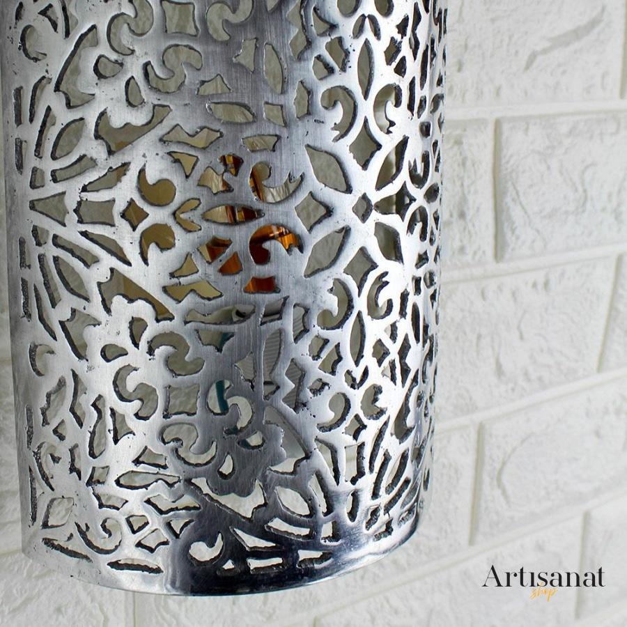 Chiseled aluminum wall light