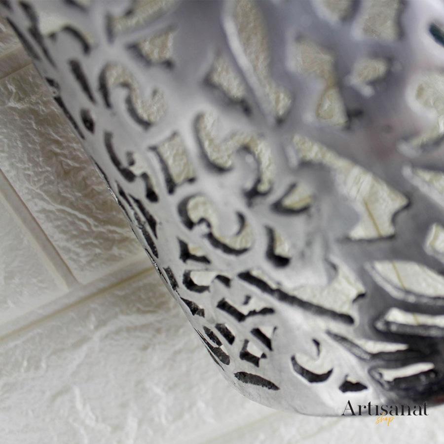 Chiseled aluminum wall light