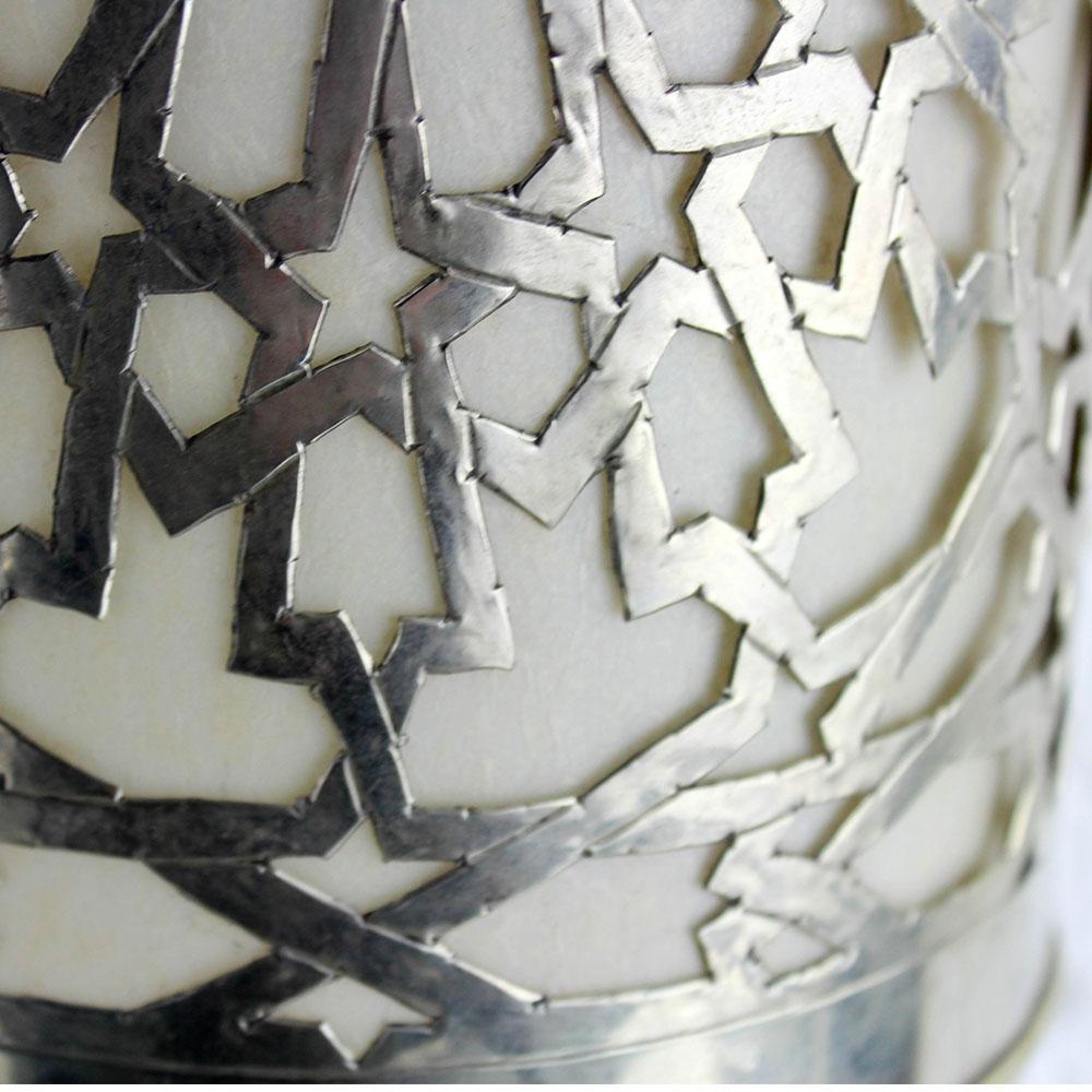 Silver-plated chiseled copper wall light