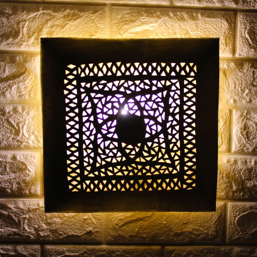 Square wall light in chiseled copper