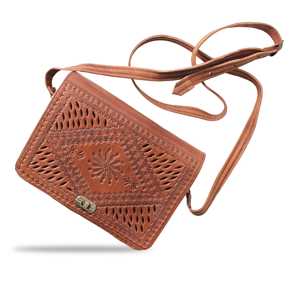 Leather shoulder bag with perforated patterns