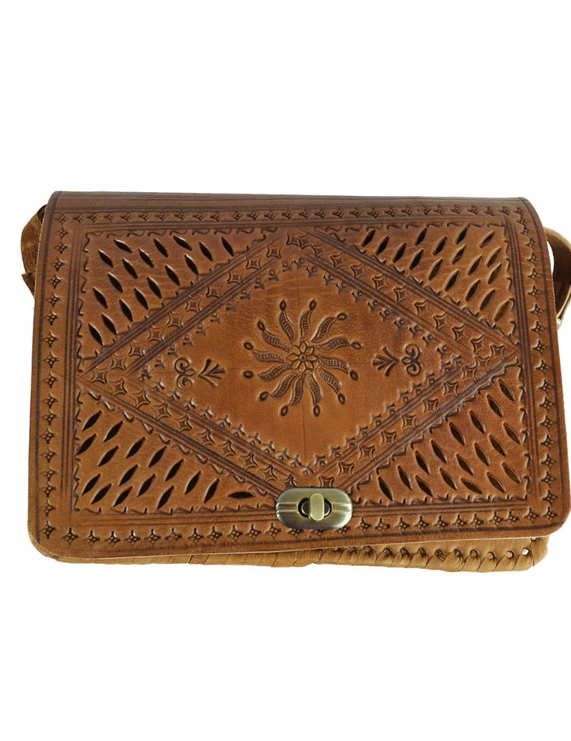 Leather shoulder bag with perforated patterns